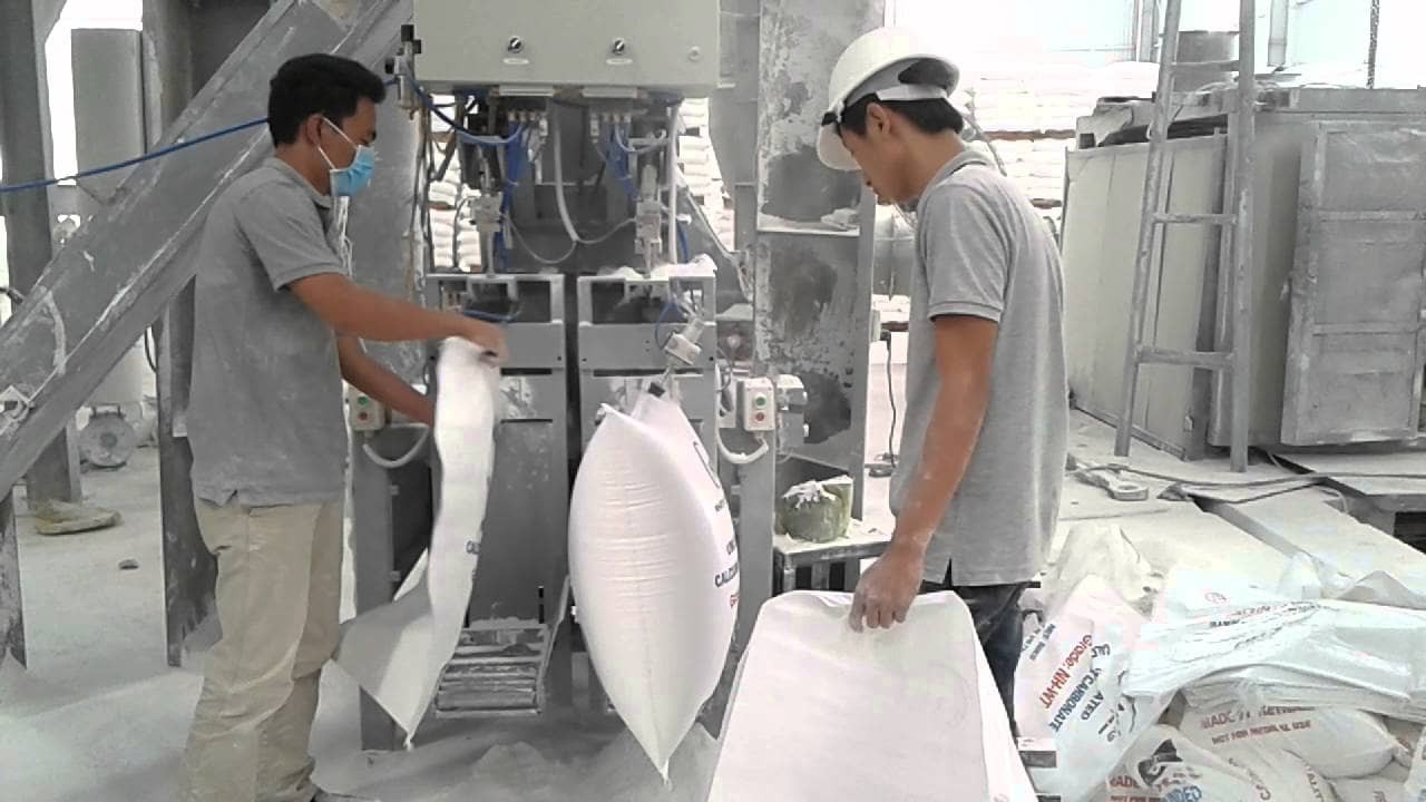 Lắp đặt máy đóng bao bột đá cho công ty nông sản Á Đông