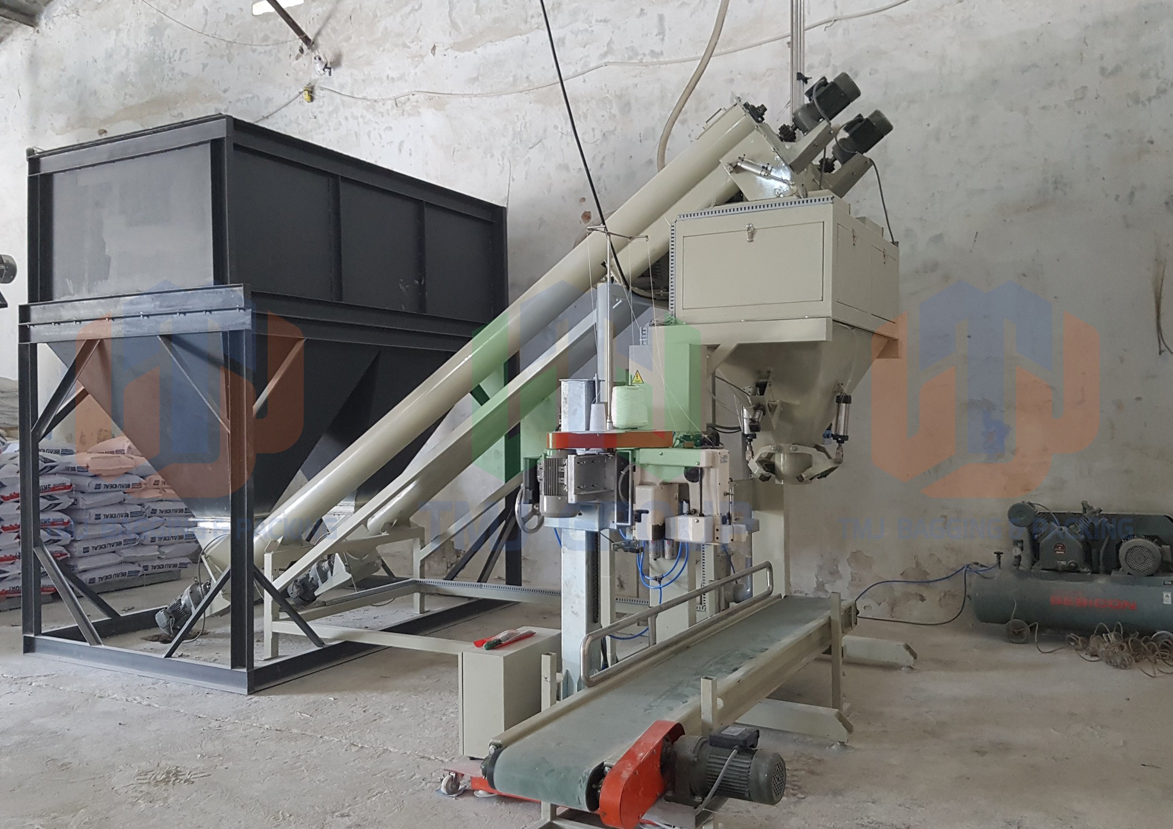 Máy cân đóng bao bột bả, keo dán gạch, vôi bột, có hút chân không