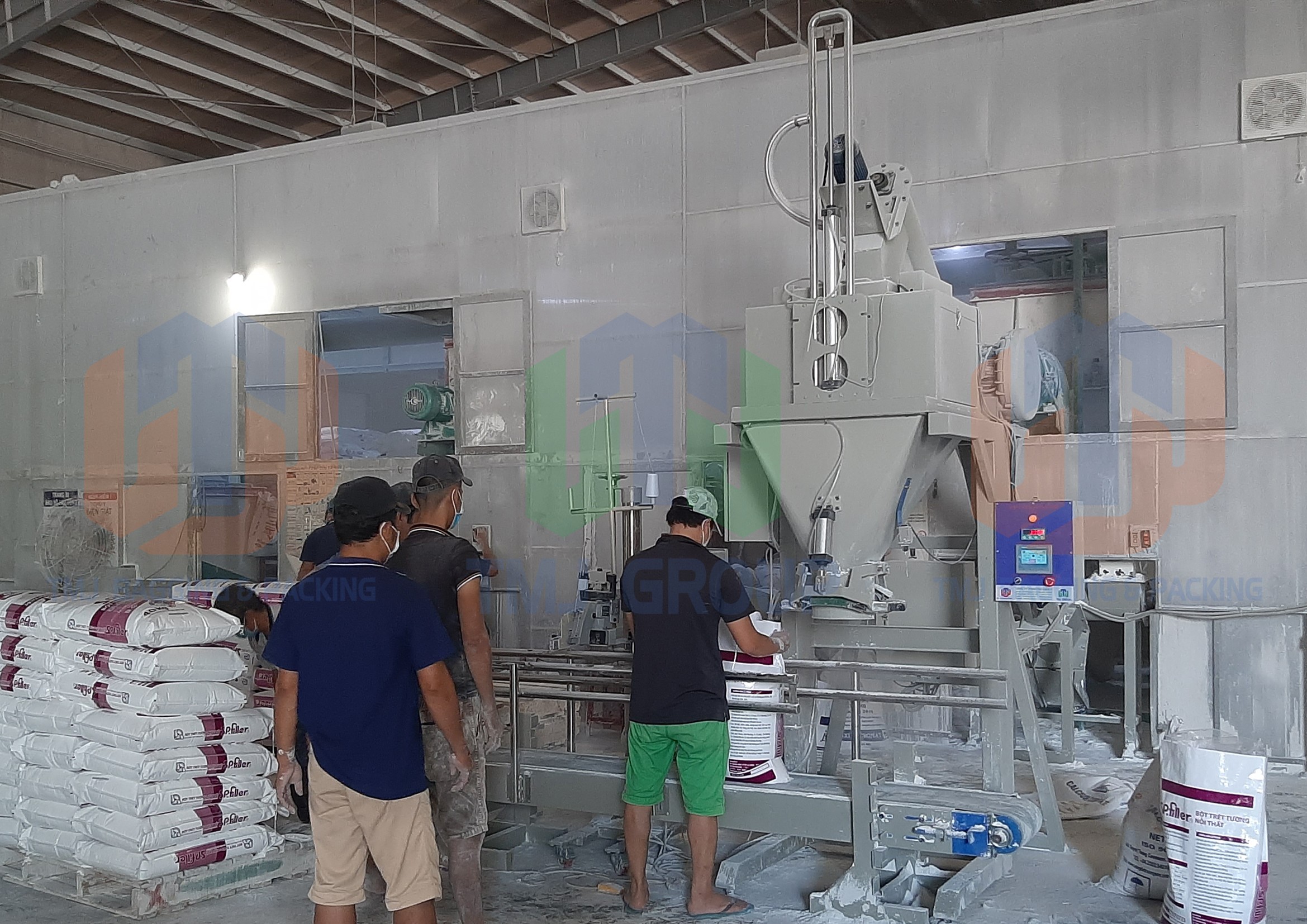 Máy cân đóng bao bột bả, bột trét tường, vôi bột, có hút chân không