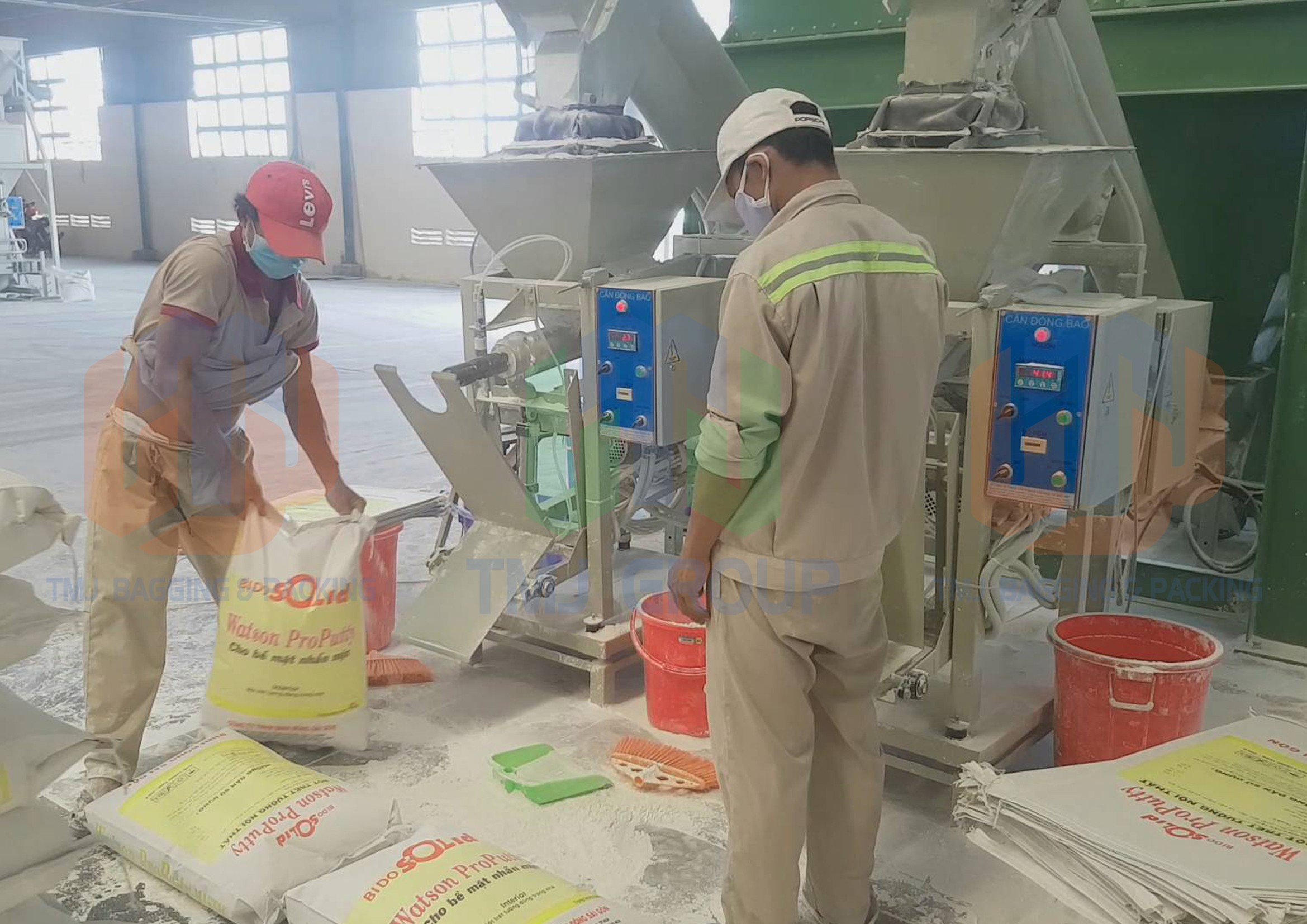 Máy cân đóng bao vữa khô, vữa xây tô, bao van